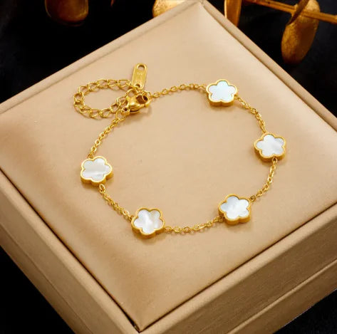 Gold Bracelet with White Drop Flower Charm